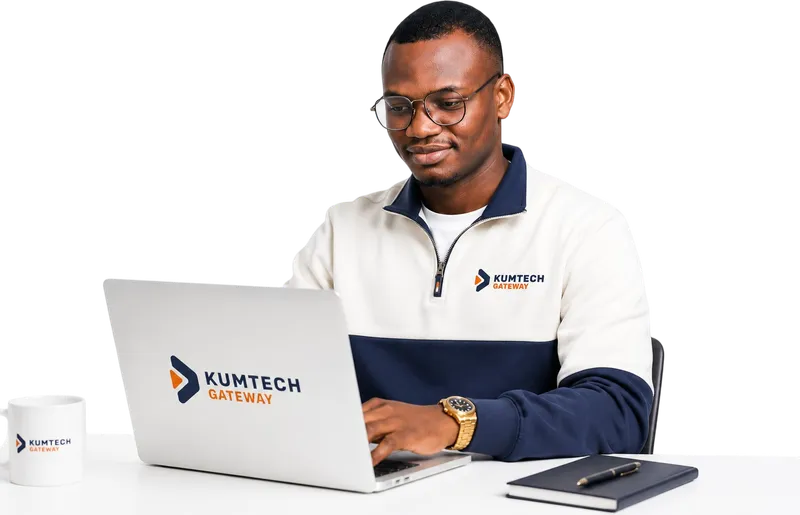 Kumtech Gateway founder working at a branded desk setup